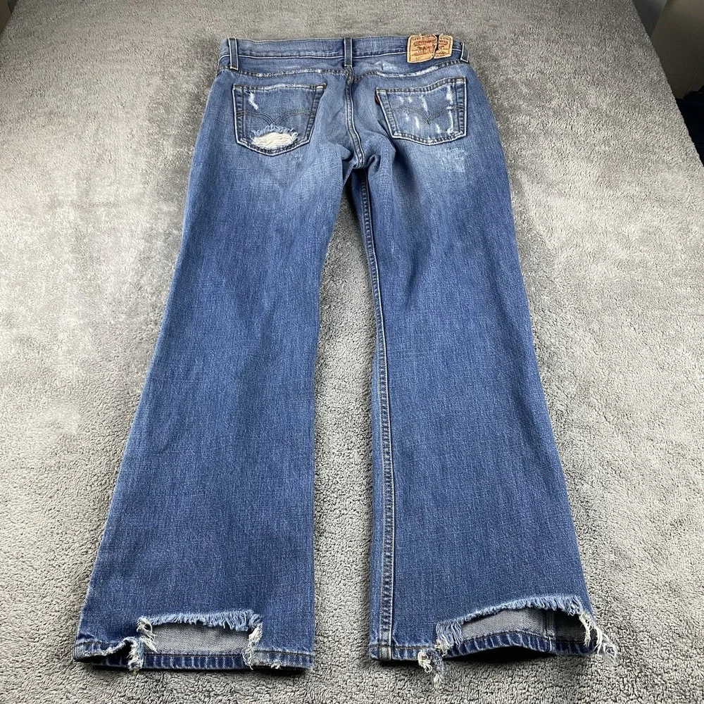 Levis 527 Low Boot Cut Jeans Mens 34x30 Blue Medium Wash Mid Rise Distressed Rip